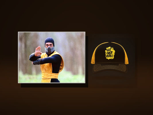 Horizontal signed 8x10 photo of Chris Casamassa as Scorpion beside the black 'Get Over Here!' trucker hat — Starter Pack Fan Pack bundle.